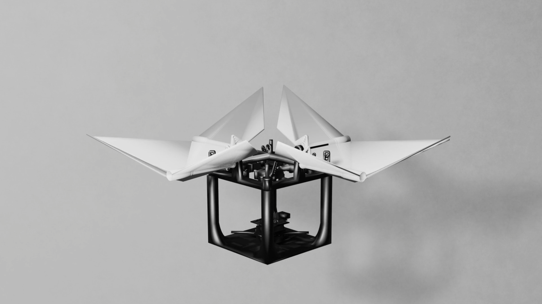 A black and white rendering of a prototype ornithopter with four pointed, angled wings and a complex mechanical central body.